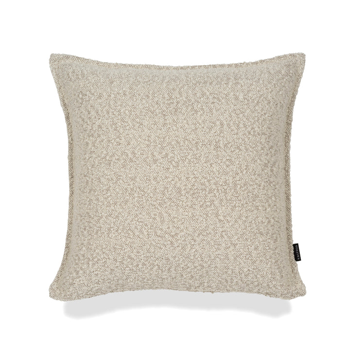 Double sided almond boucle with a 5mm closed flange detailing to the seam. Featuring an exposed brass zip to bottom seam. 