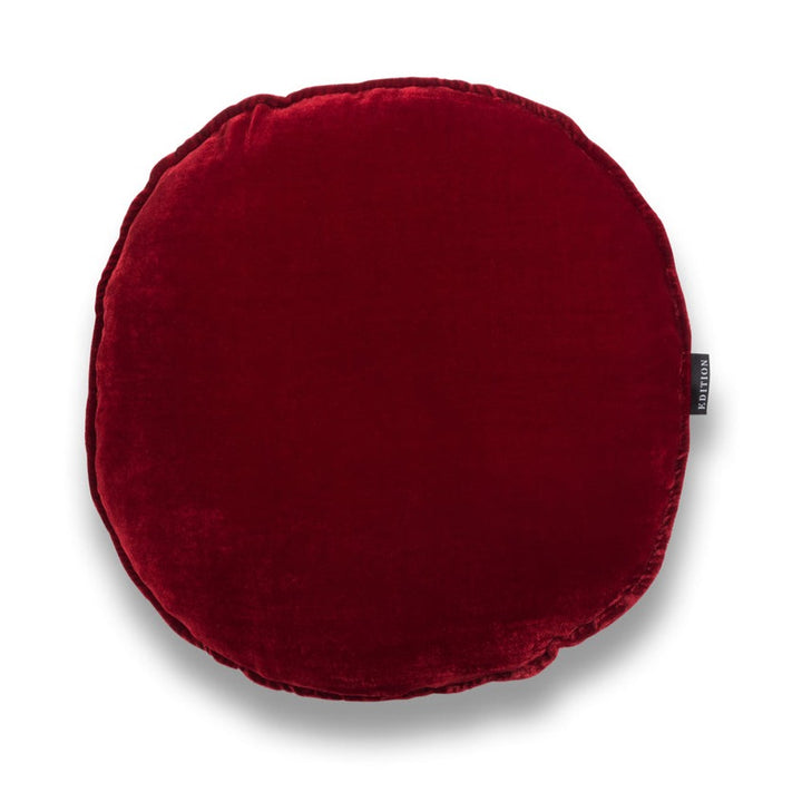 Double sided ruby red silk velvet with a 5mm closed flange detailing to the seam. 40x40cm round cushion.