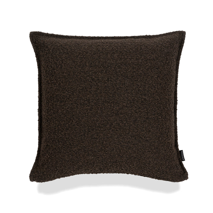 Double sided chocolate boucle with a 5mm closed flange detailing to the seam. Featuring an exposed brass zip to bottom seam. Available in 60x60cm, 50x50cm, 60x40cm and 40cm round