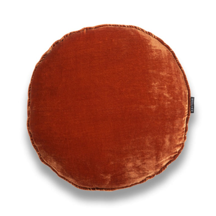Double sided rust silk velvet with a 5mm closed flange detailing to the seam. 40x40cm round cushion.